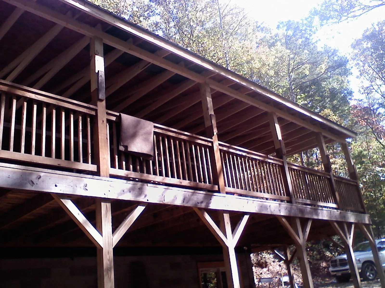 Timber framing under a new elevated porch and deck — Roof Leak Repair in Porter Ranch by Roofing Brothers